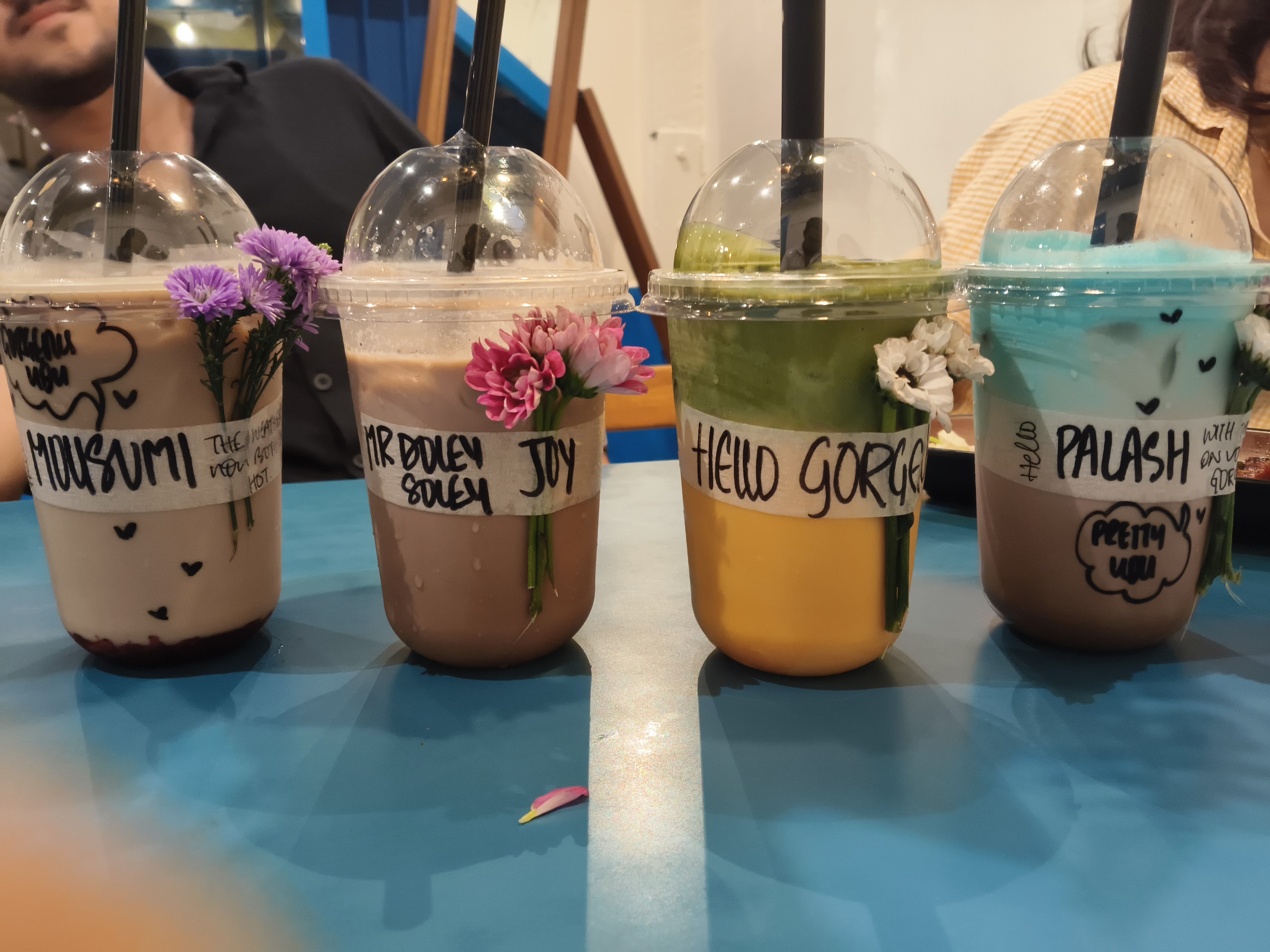 Cafe Uzan personalised handwritten drink cups